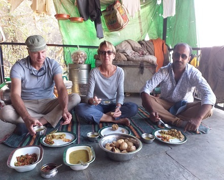 Our Guests eating food at Dev Farm Stay